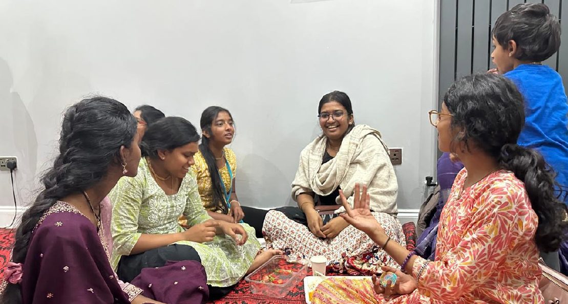 Teens receiving kirtana training