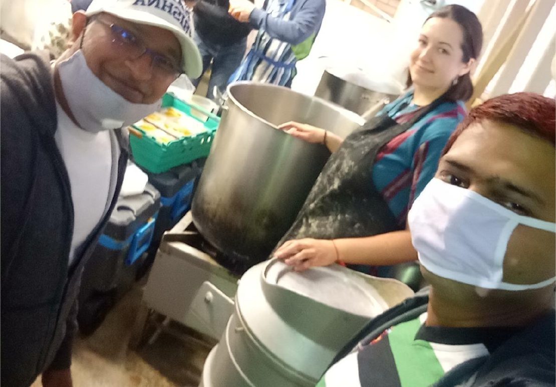 Volunteers cooking prasadam for Food for Life